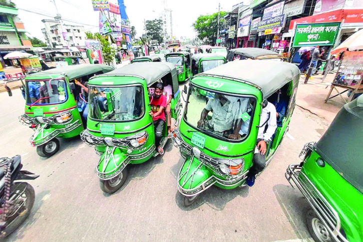 Three-wheelers park illegally on the Khulna-Jesore highway in front of Govt BL College