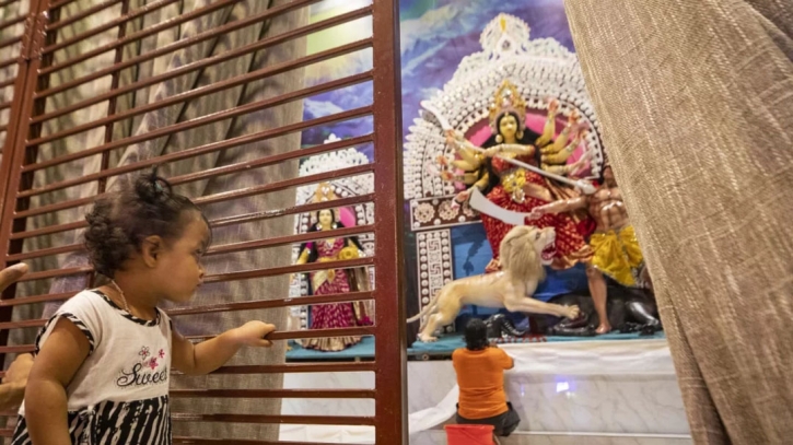 Durga Puja enthralls Dhaka children with festive fervor Durga Puja enthralls Dhaka children with festive fervor